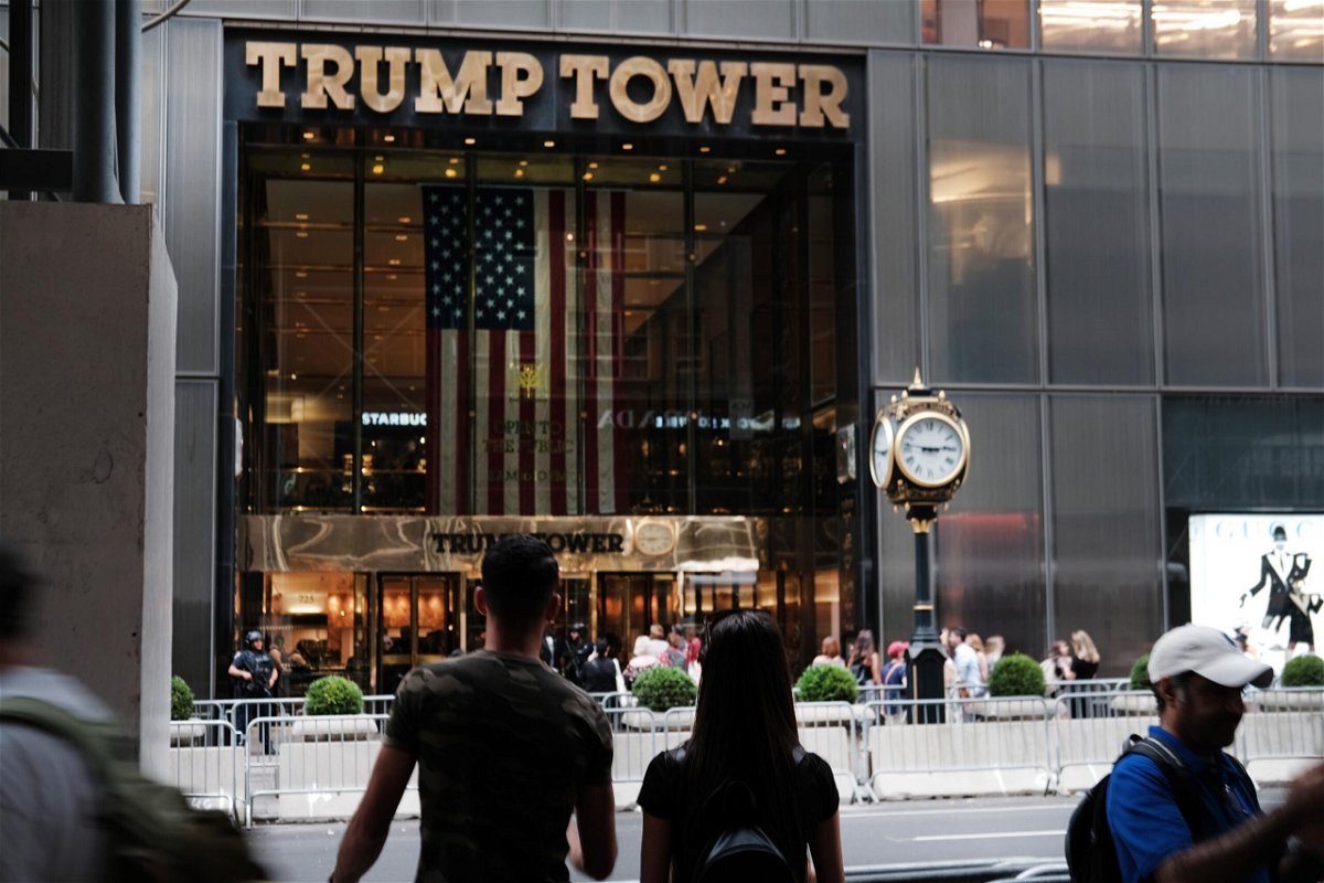 <i>Spencer Platt/Getty Images</i><br/>People walk by Trump Tower on September 26