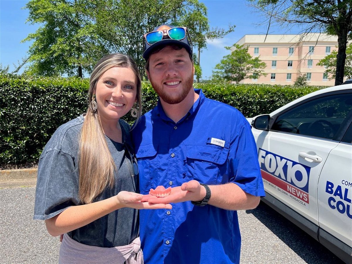 <i>Hal Scheurich/WALA</i><br/>Aaron and Blaire Welborn stopped by the Fox 10 News Studios to show the dentures Aaron found while snorkeling in the Gulf of Mexico.