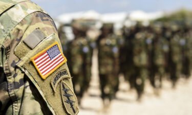 U.S. Army soldiers deployed with U.S. Army Forces Africa stand with Somali National Army soldiers in May 2017