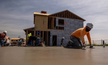 Contractors work in a housing development in Antioch