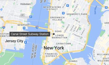The victim was seated in the last car of a Manhattan-bound "Q" line train