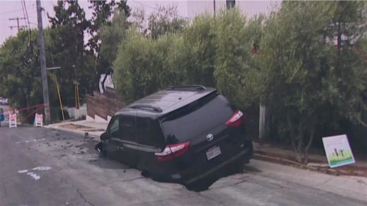 <i>KPIX</i><br/>Crews with the East Bay Municipal Utility District responded to a neighborhood in the Berkeley Hills Wednesday night after a sinkhole formed and swallowed up a parked minivan.