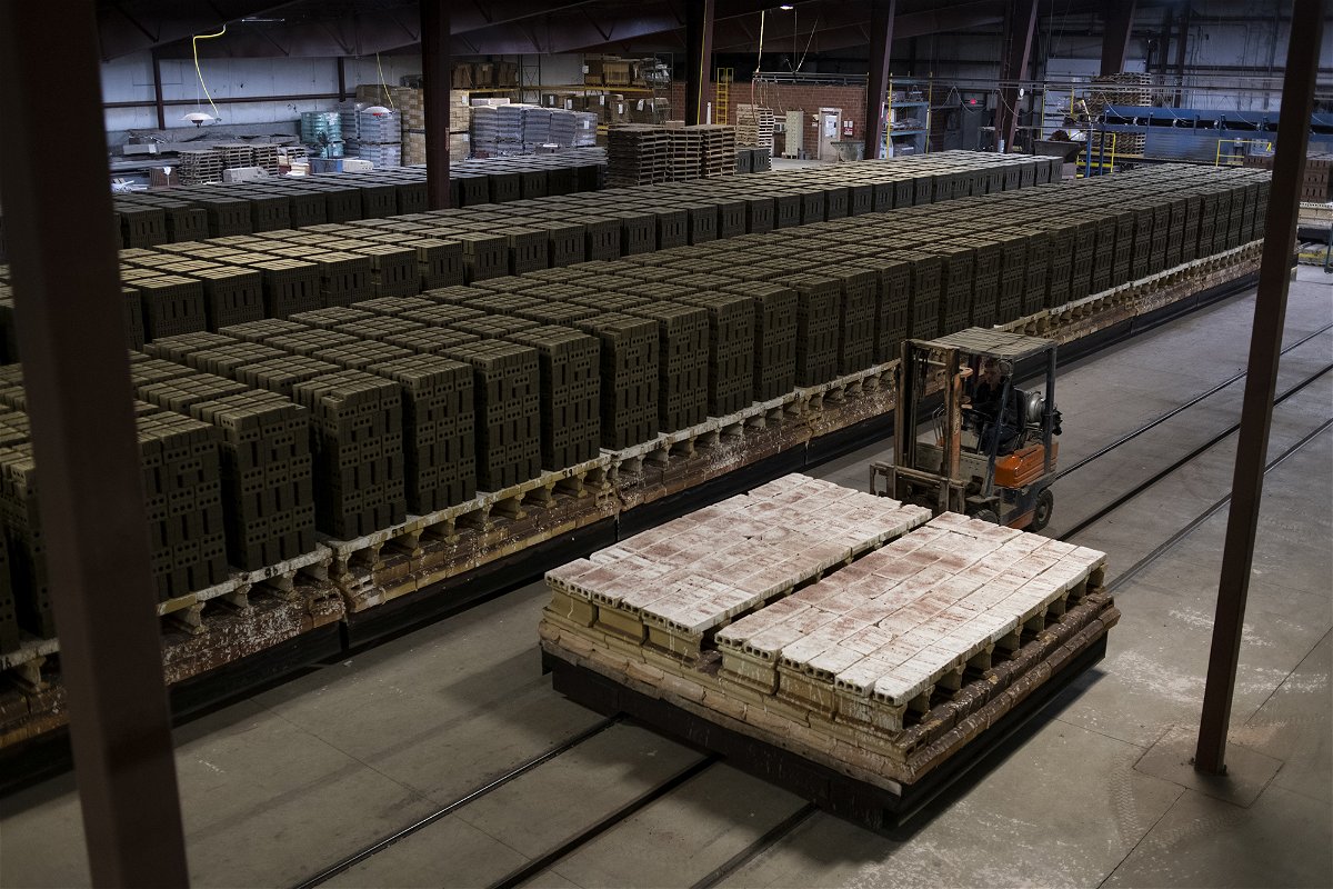 A worker uses a forklift to carry refractory bricks at the Bowerston Shale Co. facility in Hanover, Ohio, U.S., on Thursday, Jan. 7, 2021. The U.S. Census Bureau released wholesale inventories figures on January 8. Photographer: Ty Wright/Bloomberg via Getty Images