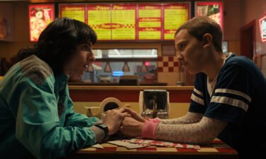 (L to R) Finn Wolfhard as Mike Wheeler and Millie Bobby Brown as Eleven in Netflix's Stranger Things. Netflix lost roughly a million customers last quarter — the most in the company's 25-year history.