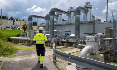 An employee of Uniper Energy Storage walks through the above-ground facilities of a natural gas storage facility in Bierwang