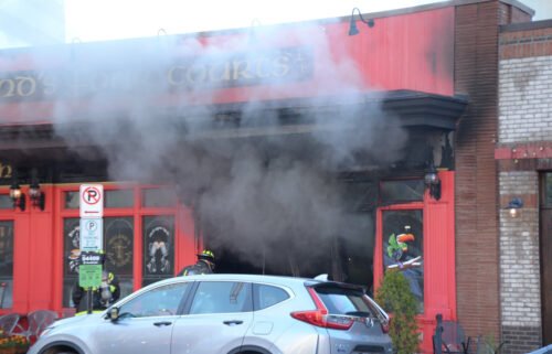 Firefighters at Ireland's Four Courts pub and restaurant in Arlington