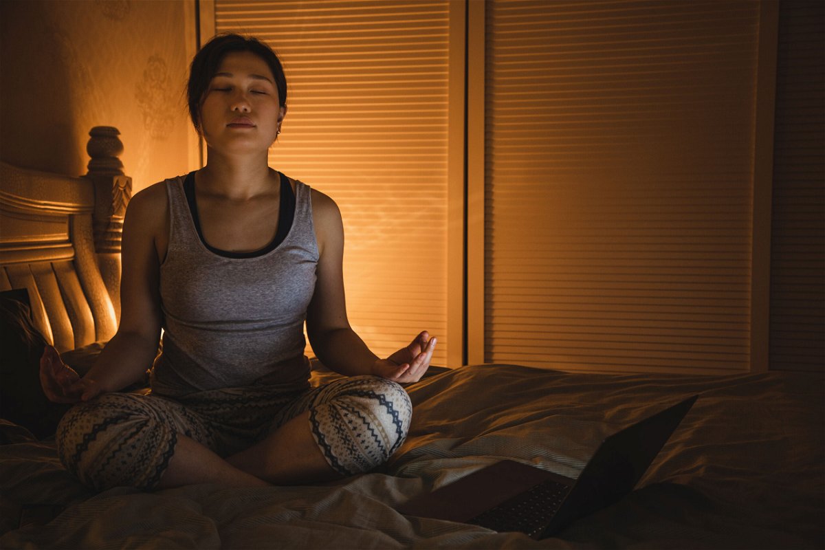 <i>Kilito Chan/Moment RF/Getty Images</i><br/>Meditation can help quiet the mind and let you get to sleep.