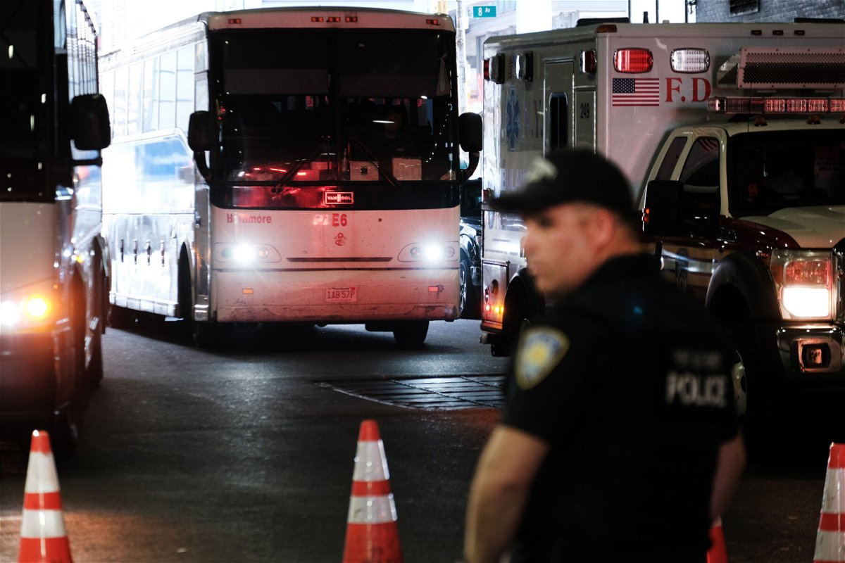 <i>Spencer Platt/Getty Images</i><br/>A bus carrying migrants who crossed the border from Mexico into Texas arrives into the Port Authority station.