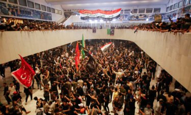 Supporters of populist leader Moqtada al-Sadr gather during a sit-in at Iraq's parliament in Baghdad on July 31.