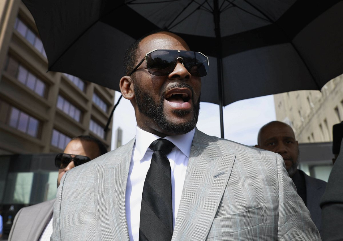 <i>Amr Alfiky/AP</i><br/>Musician R. Kelly leaves the Leighton Criminal Court building in Chicago on June 6