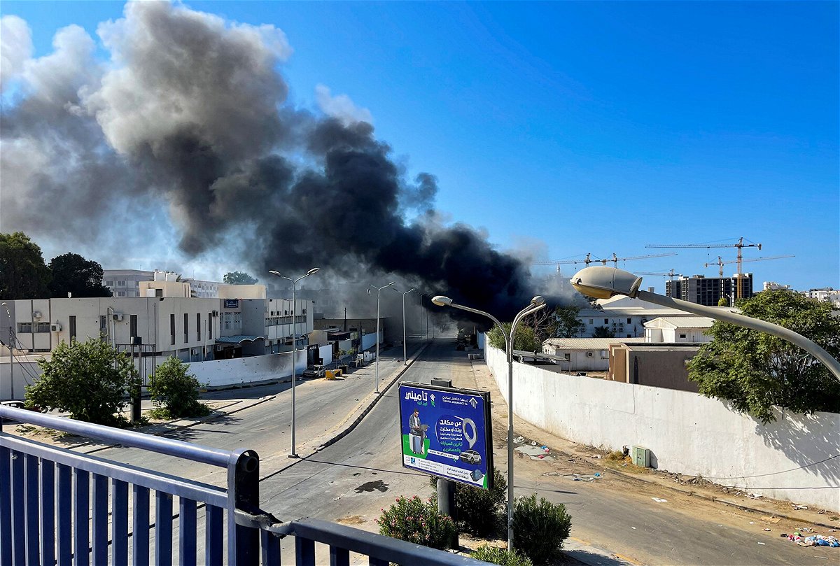 <i>Hazem Ahmed/Reuters</i><br/>Smoke rises in the sky following clashes in Tripoli