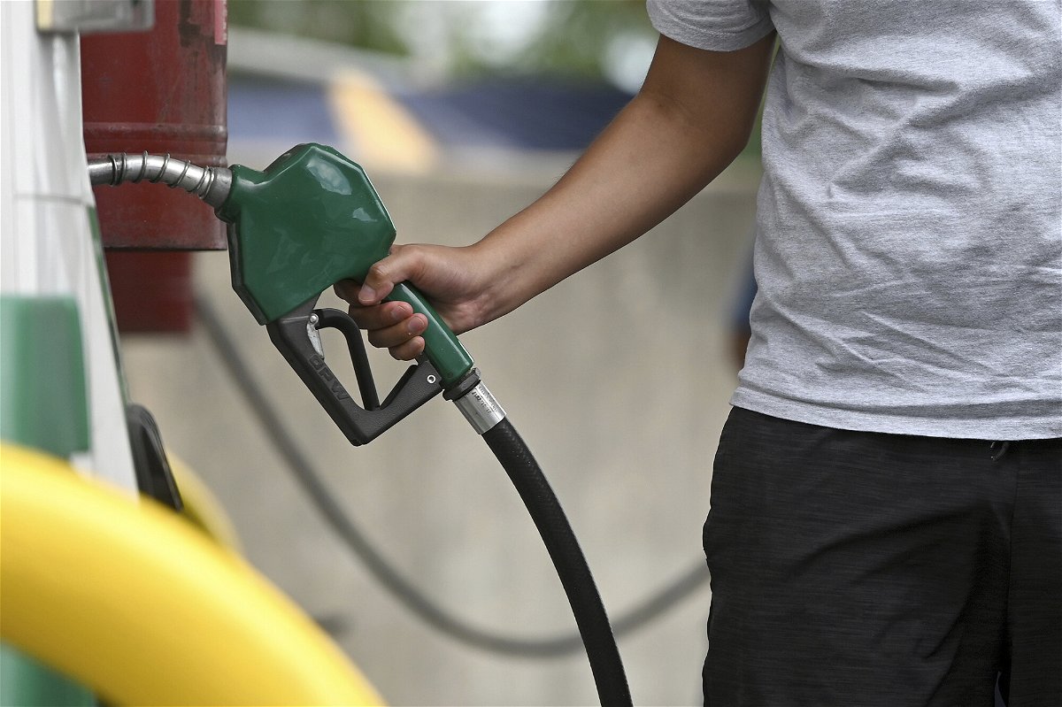 <i>Anthony Behar/Sipa USA/AP</i><br/>Lower gas prices helped consumer confidence bounce back in August