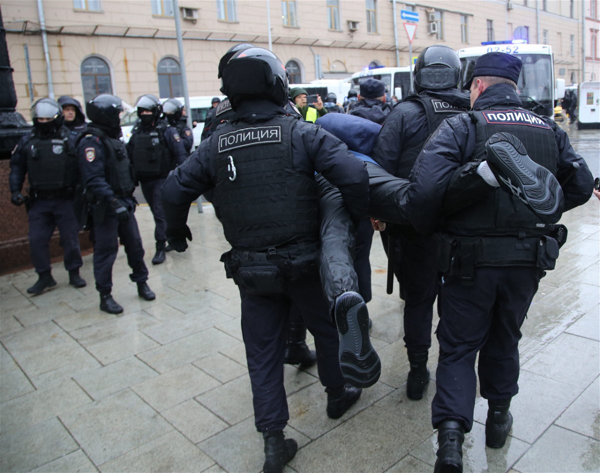 <i>Contributor/Getty Images</i><br/>Police officers detain a protester during an anti-mobilization protest in Moscow