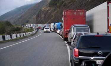 The situation at a border and customs checkpoint shows a line of cars on the road on Friday in North Ossetia