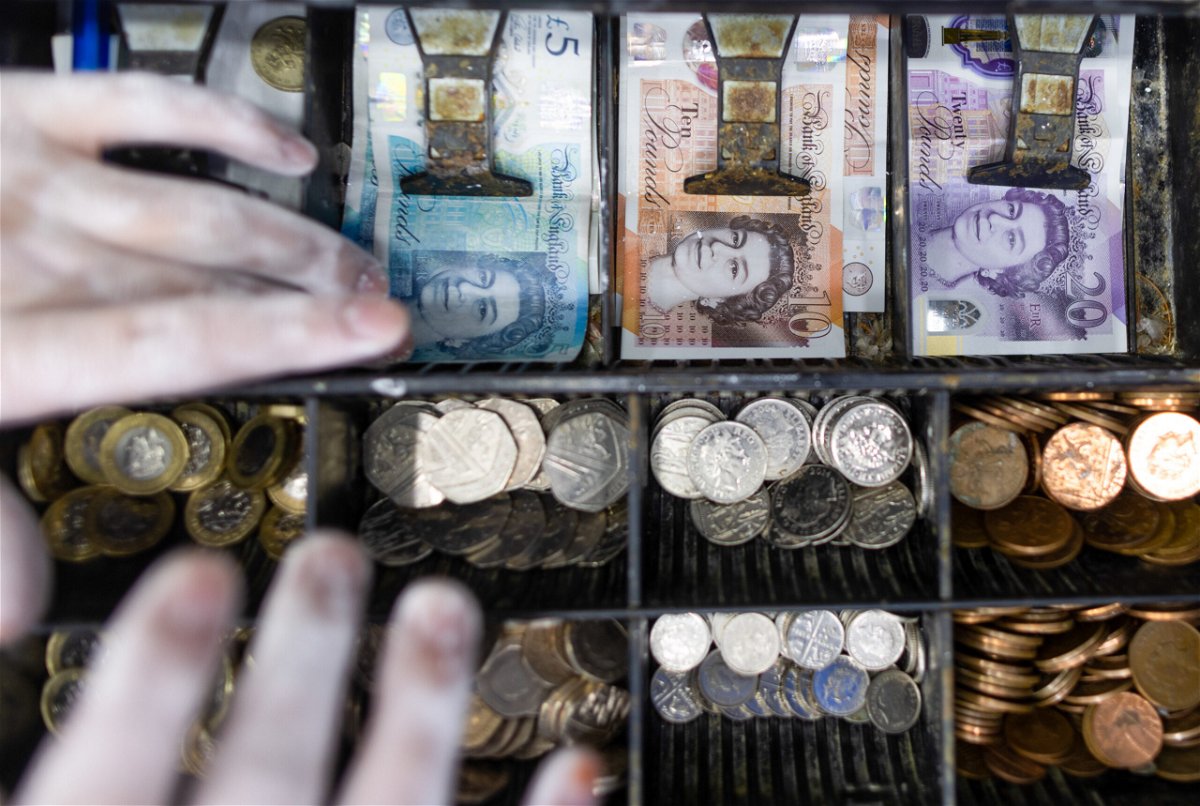 <i>Chris Ratcliffe/Bloomberg/Getty Images</i><br/>The British pound crashed below $1.10 by mid-afternoon on September 23. British pound banknotes and coins in a shop in Barking