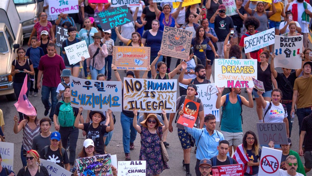 Thousands of immigrants and supporters join the Defend DACA March in September 2017 in Los Angeles, California. A federal appeals court largely upheld a district court ruling finding that the Obama-era DACA program is unlawful.

