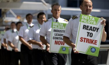 Delta Air Lines pilots picketed on June 30 at Minneapolis-Saint Paul International Airport in Minneapolis. Delta Air Lines pilots intensified their push for improved pay by insisting they will strike if they do not get a new contract.