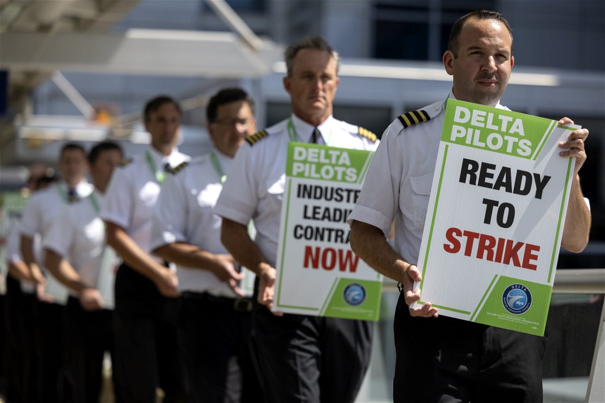 <i>Carlos Gonzalez/Star Tribune/Getty Images</i><br/>Delta Air Lines pilots picketed on June 30 at Minneapolis-Saint Paul International Airport in Minneapolis. Delta Air Lines pilots intensified their push for improved pay by insisting they will strike if they do not get a new contract.