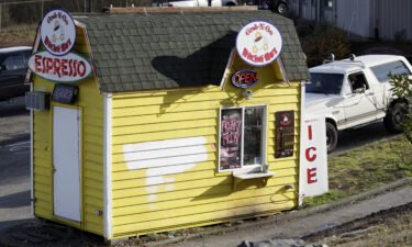 A customer drives into a Grab-N-Go Bikini Hut espresso stand in February 2010