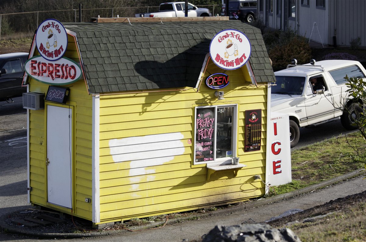 <i>Ted S. Warren/AP</i><br/>A customer drives into a Grab-N-Go Bikini Hut espresso stand in February 2010