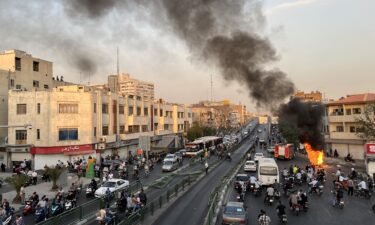A motorcycle on fire in the Iranian capital Tehran