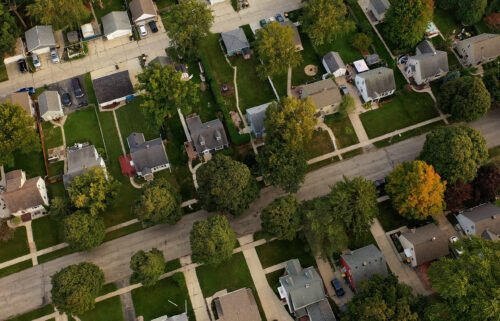 Fannie Mae and Freddie Mac will back loans of more than $1 million. Pictured is an aerial view of a suburban neighborhood in the United States.