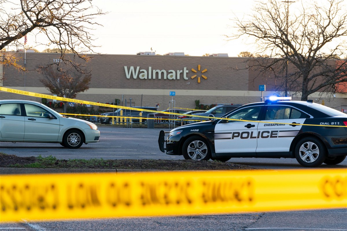 <i>Alex Brandon/AP</i><br/>Law enforcement work the scene of a mass shooting at a Walmart in Chesapeake