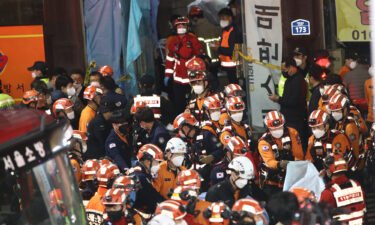 Emergency services treat injured people in Seoul on October 30.