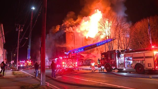 <i>WCVB</i><br/>Parts of the roof collapsed as firefighters in Rhode Island battled a fire that engulfed a furniture store.
