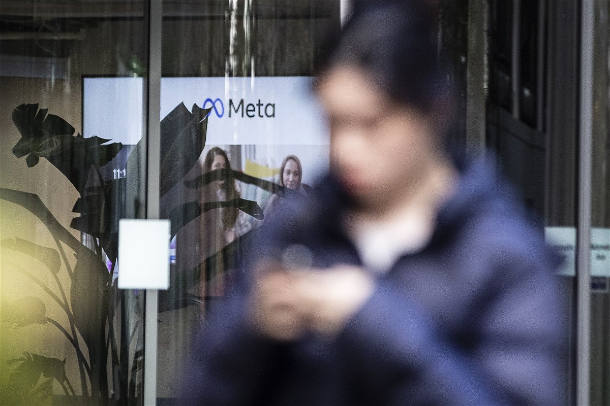 <i>Joshua Bratt/PA Images/Getty Images</i><br/>A person walking past the offices of Meta