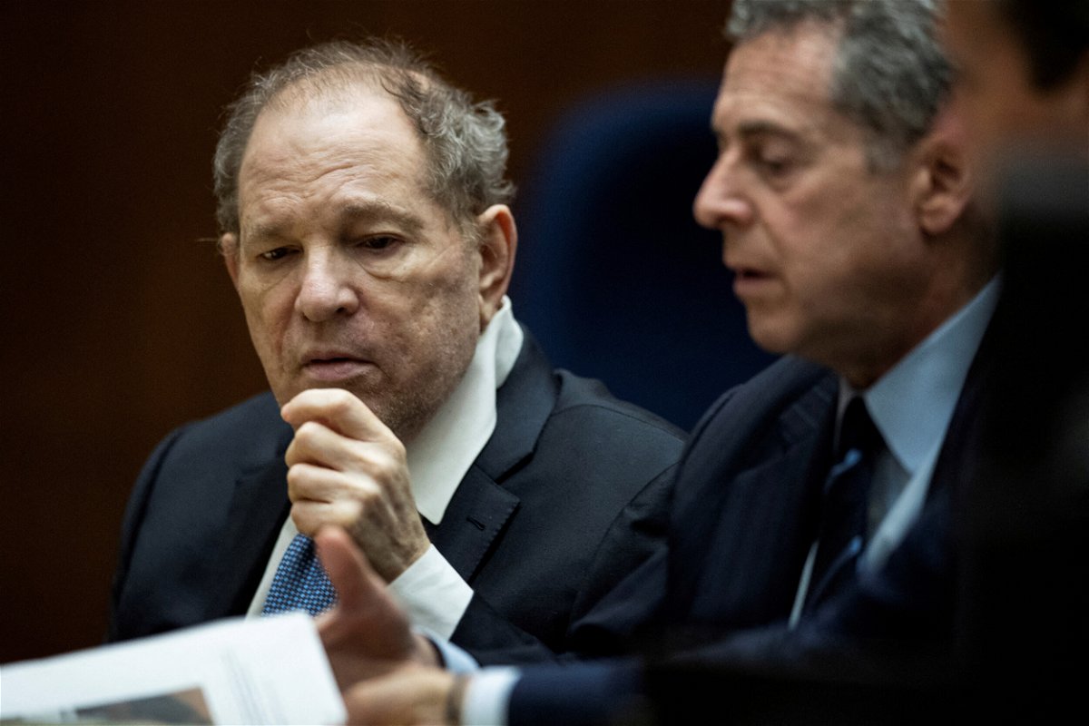 <i>Etienne Laurent/Pool/Reuters/FILE</i><br/>Former film producer Harvey Weinstein (left) interacts with his attorney