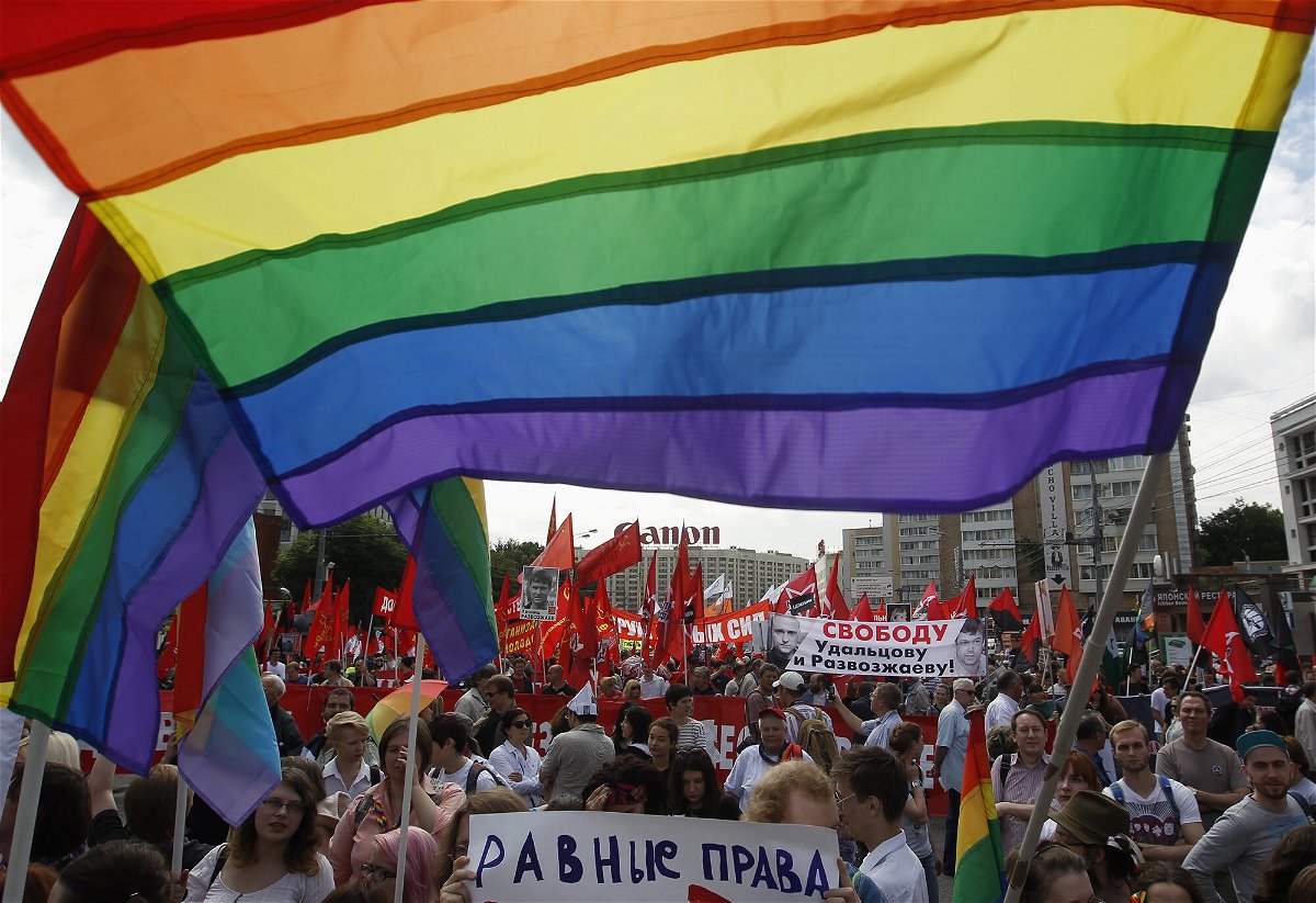 <i>Maxim Shemetov/Reuters</i><br/>Gay rights activists take part in an opposition protest march in Moscow