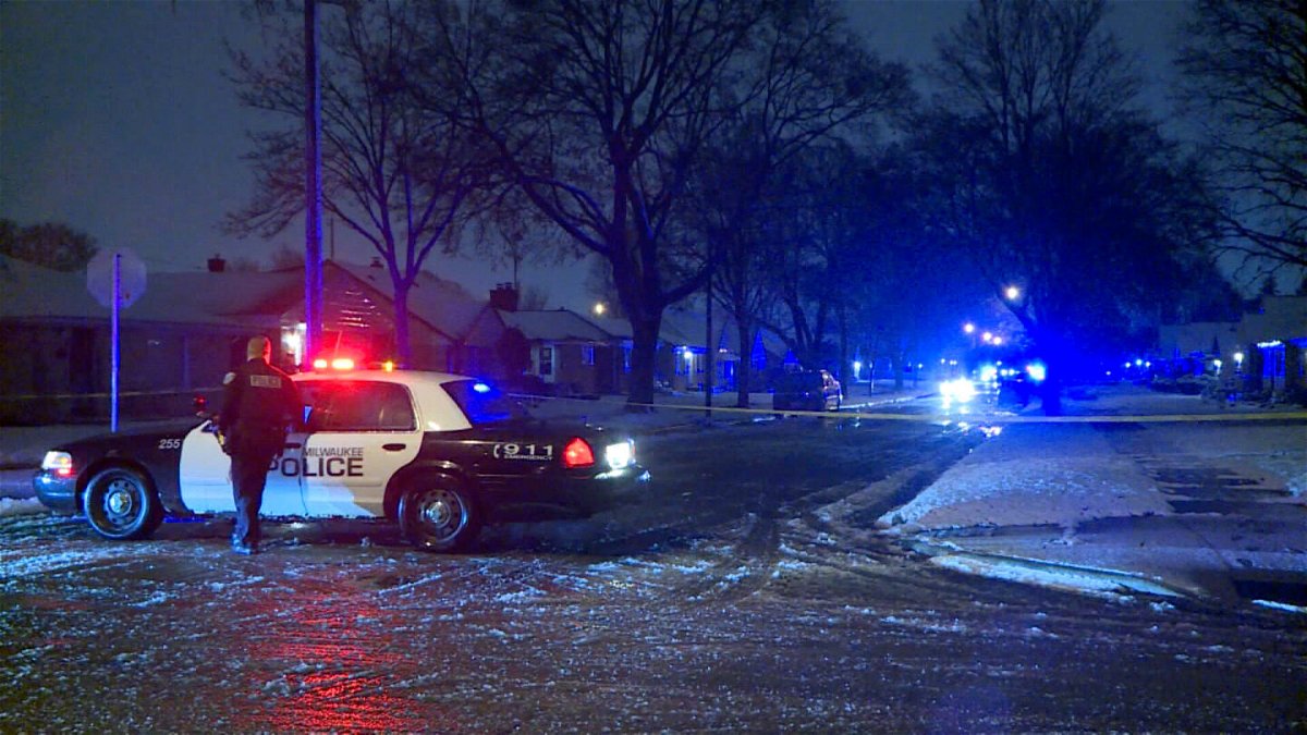 <i>WDJT</i><br/>Police secure the scene where a mail carrier was shot to death Friday evening in Milwaukee.