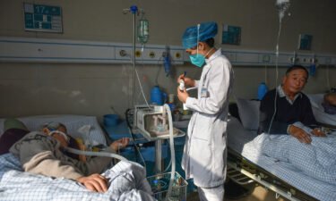 The World Health Organization is accusing China of "under-representing" the severity of its Covid outbreak. Pictured are Covid-19 patients in eastern China on January 4.