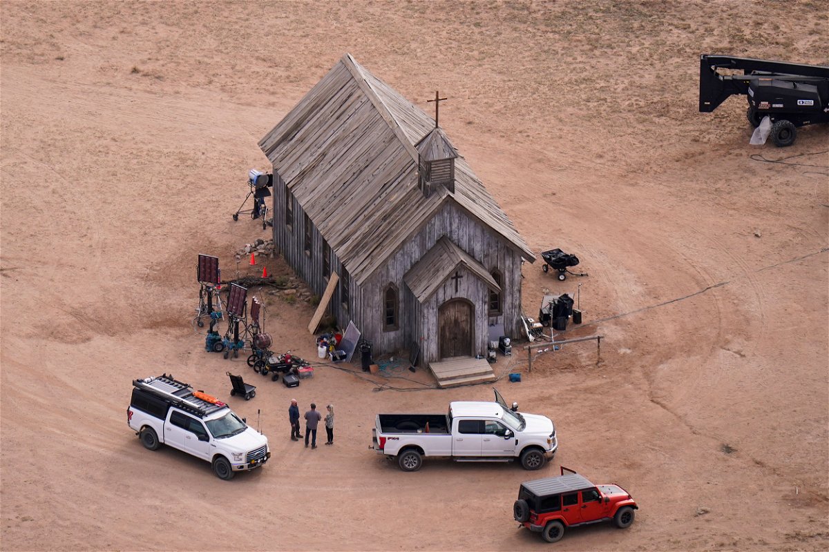 FILE - This aerial photo shows part of the Bonanza Creek Ranch film set in Santa Fe, N.M., on Saturday, Oct. 23, 2021, where cinematographer Halyna Hutchins died from a gun fired by actor Alec Baldwin. The family of a cinematographer shot and killed by Alec Baldwin on the set of the film “Rust” has agreed to settle a lawsuit against Baldwin and the movie's producers, and production will resume on the project. (AP Photo/Jae C. Hong, File)