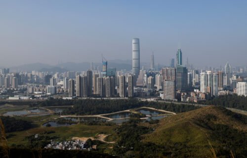 Skyscrapers in Shenzhen are viewed from the border in Hong Kong on December 14