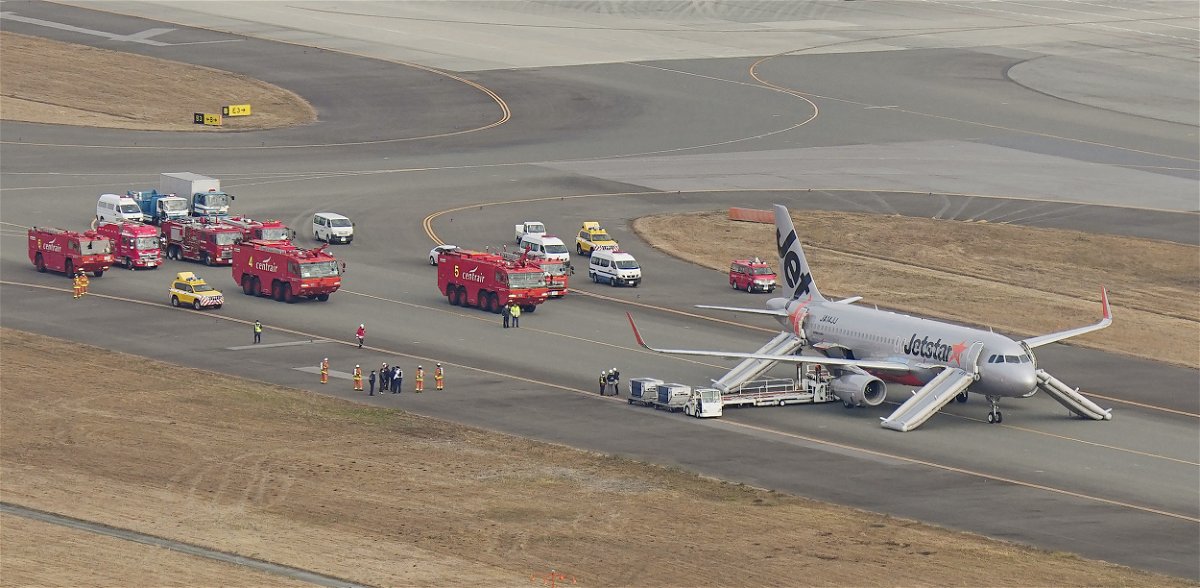 <i>Kyodo News/Getty Images</i><br/>A Jetstar plane made an emergency landing at Japan's Chubu airport following a bomb threat on January 7.