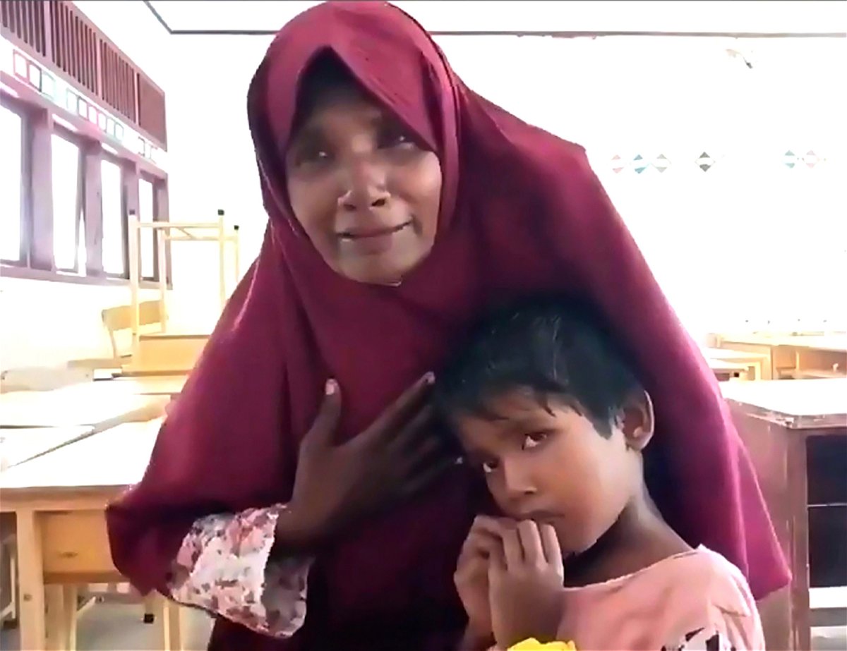 <i>CNN</i><br/>Hatemon Nesa and her 5-year-old daughter Umme Salima at a shelter in Aceh province in Indonesia.
