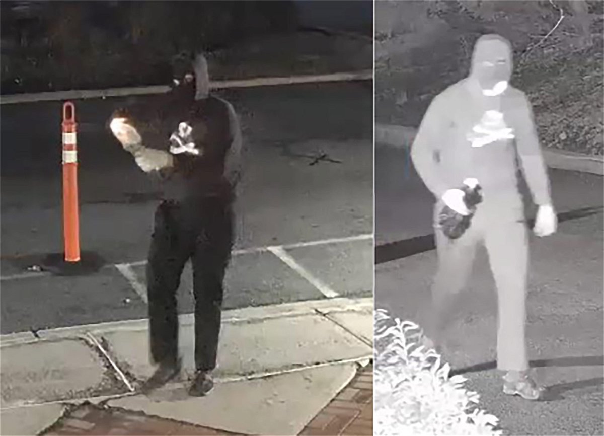 <i>Bloomfield Police</i><br/>A masked suspect is seen lighting a Molotov cocktail in front of Temple Ner Tamid in a still image from surveillance footage in Bloomfield
