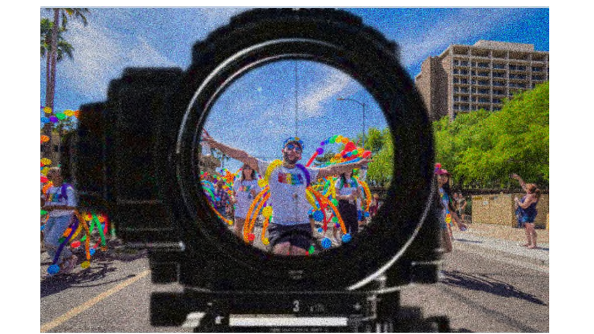 Exhibit #68 People v Anderson Aldrich, Rifle scope on top of a gay pride parade image