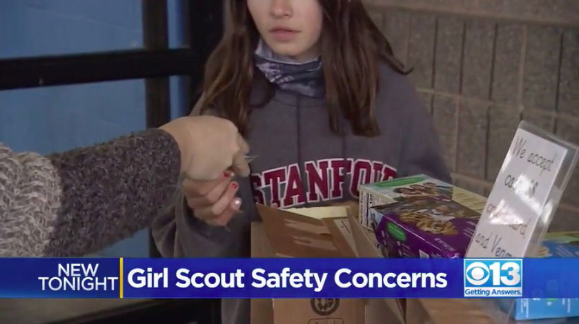 A Girl Scout is handed money for cookies at a pop-up booth at Granite Bay. The troop leader said, at this time, the best way to support the injured Girl Scouts is to buy from any local troops in Granite Bay and Roseville.
