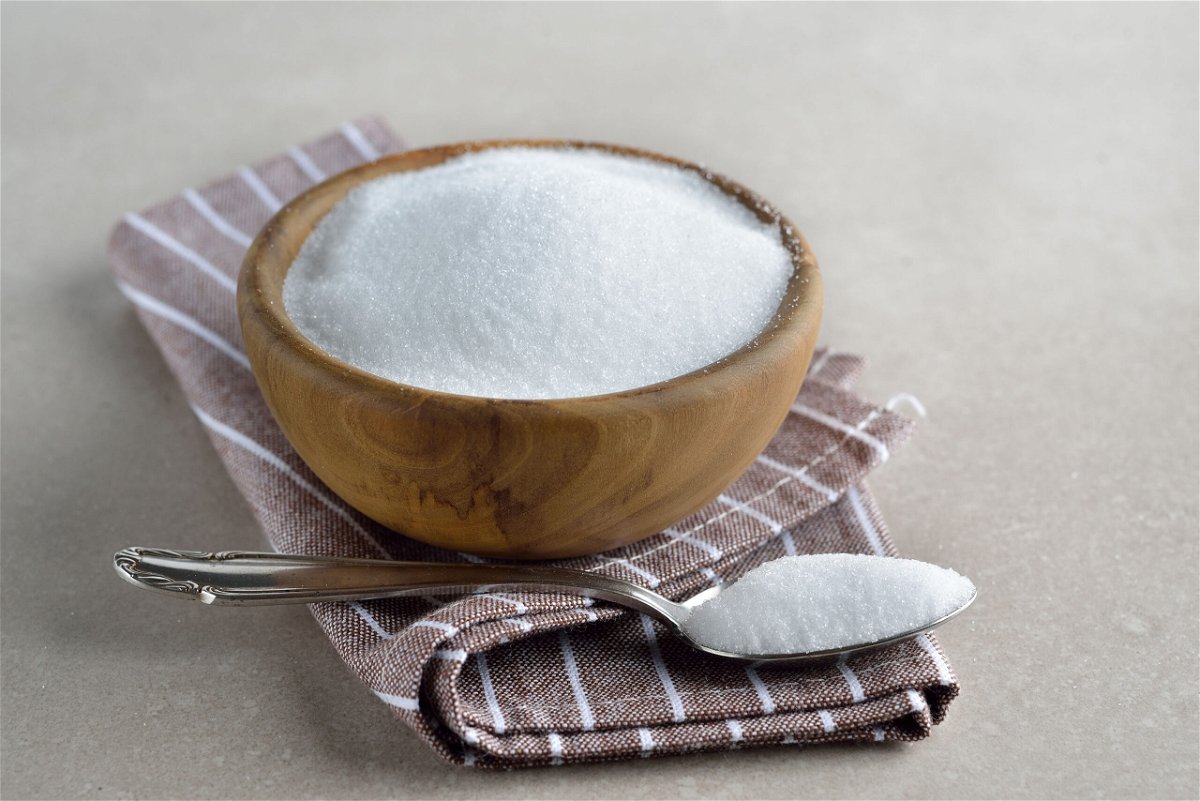 Healthy sugar substitute erythritol on a gray background