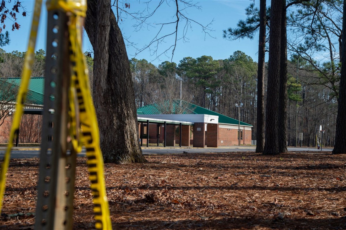<i>Jay Paul/Getty Images</i><br/>Police tape hangs from a sign post outside Richneck Elementary School following a shooting on January 7 in Newport News