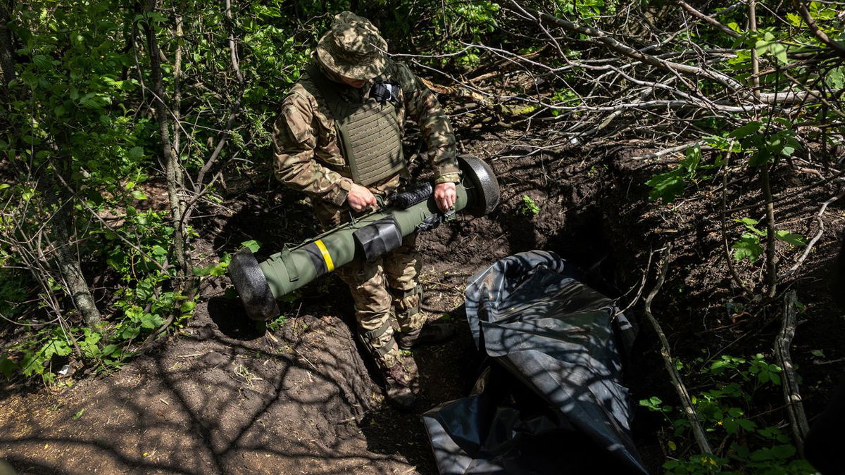 A Ukrainian Army soldier places a US-made Javelin missile in a fighting position on the frontline on May 20, 2022, in Kharkiv Oblast, Ukraine.
