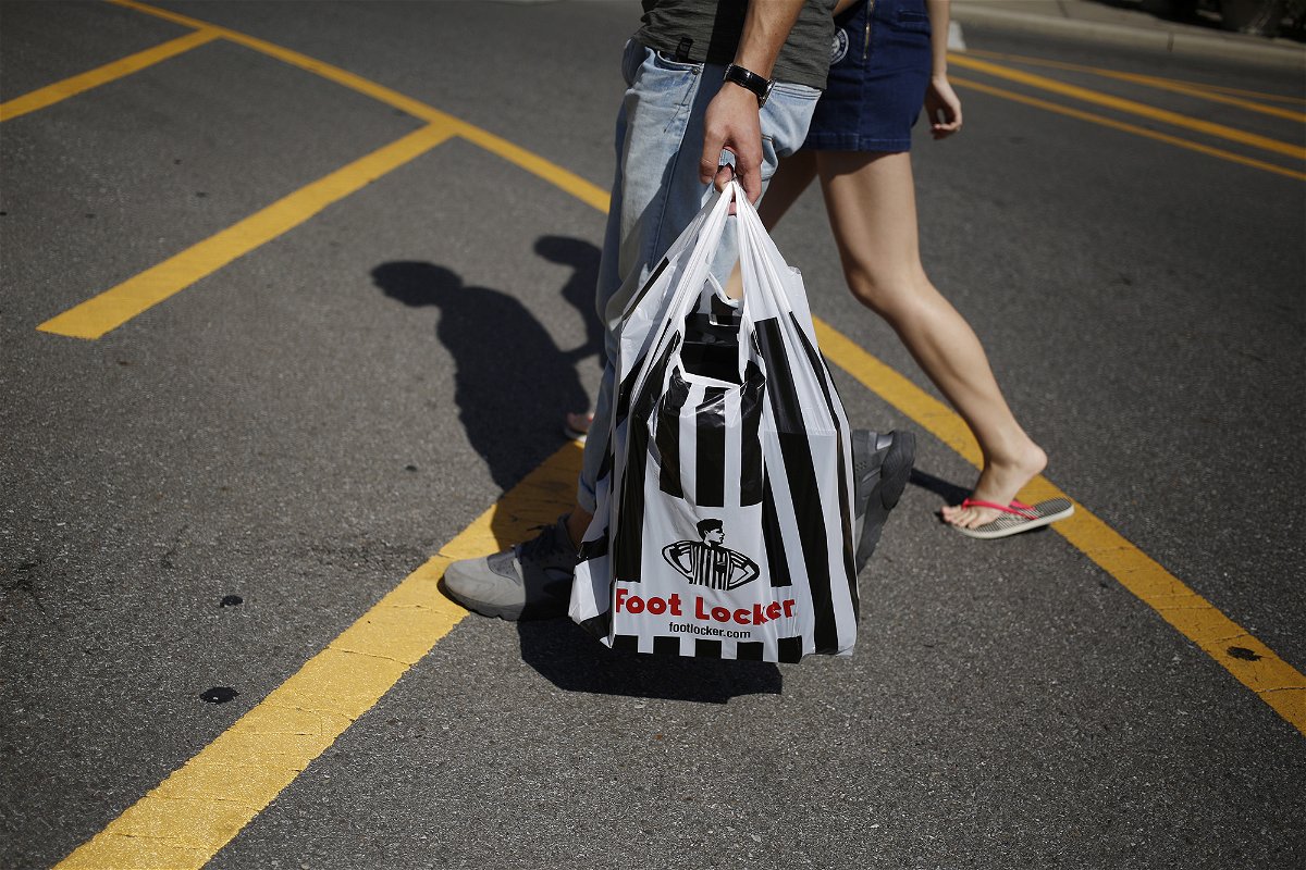 <i>Luke Sharrett/Bloomberg/Getty Images</i><br/>Foot Locker is planning to shut 400 stores by 2026 as it strives to become more relevant to younger shoppers and pictured