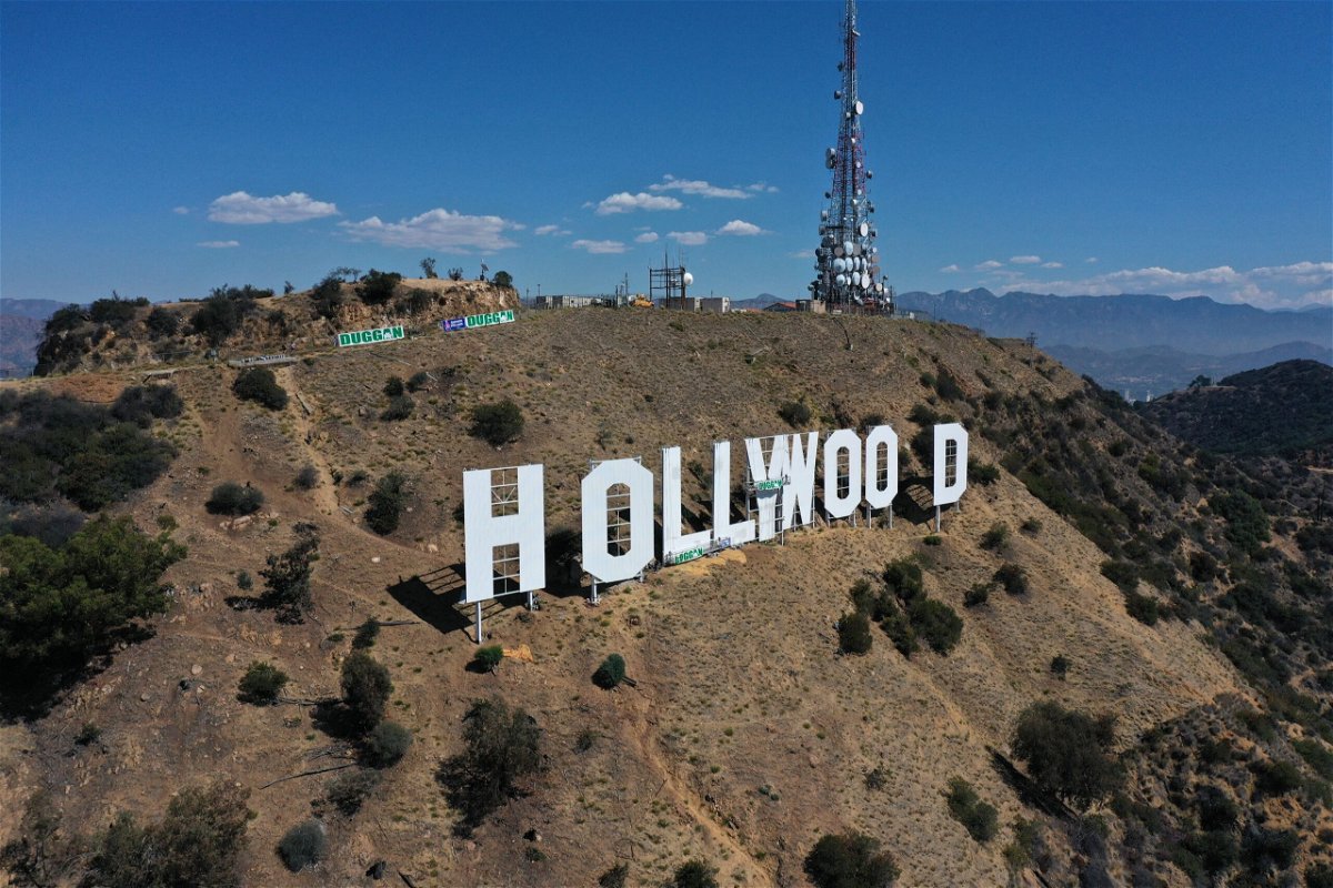 <i>Robyn Beck/AFP/Getty Images/FILE</i><br/>The Hollywood sign is seen as it is repainted in preparation for its 100th anniversary in 2023