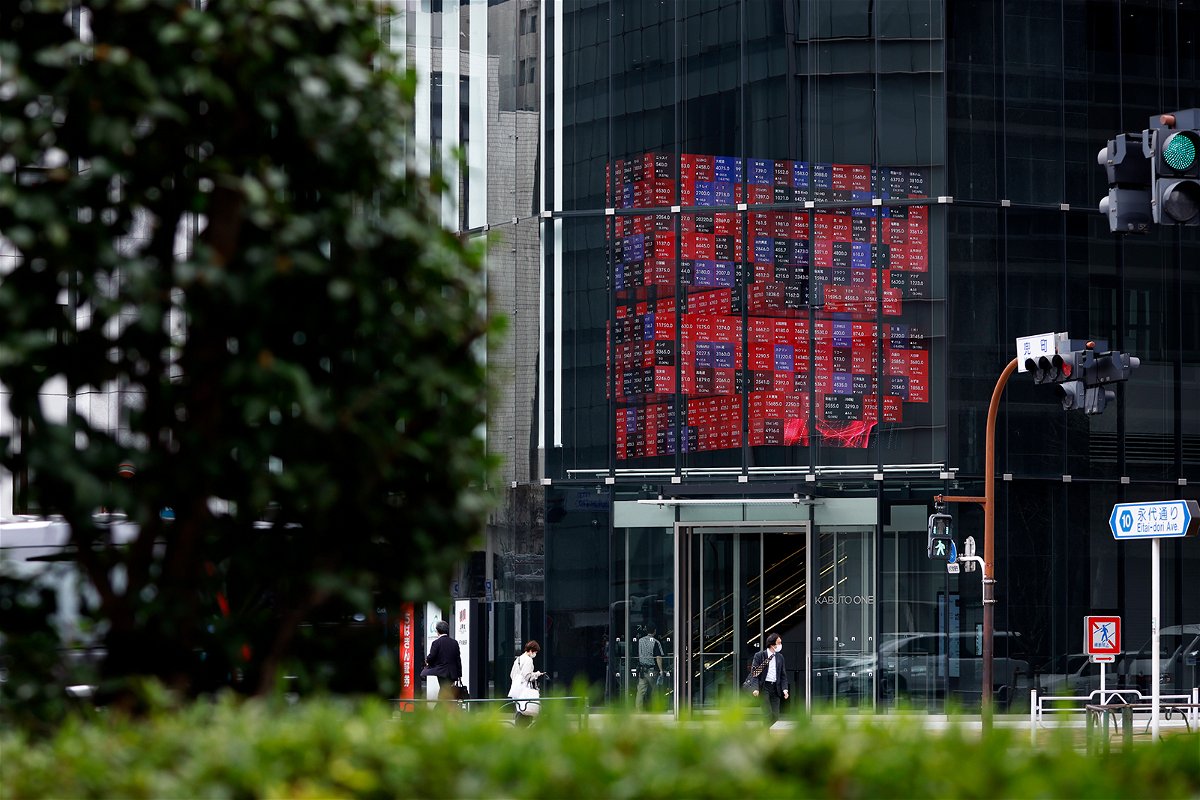 <i>Kiyoshi Ota/Bloomberg/Getty Images</i><br/>An electronic stock board displayed inside the Kabuto One building in Tokyo