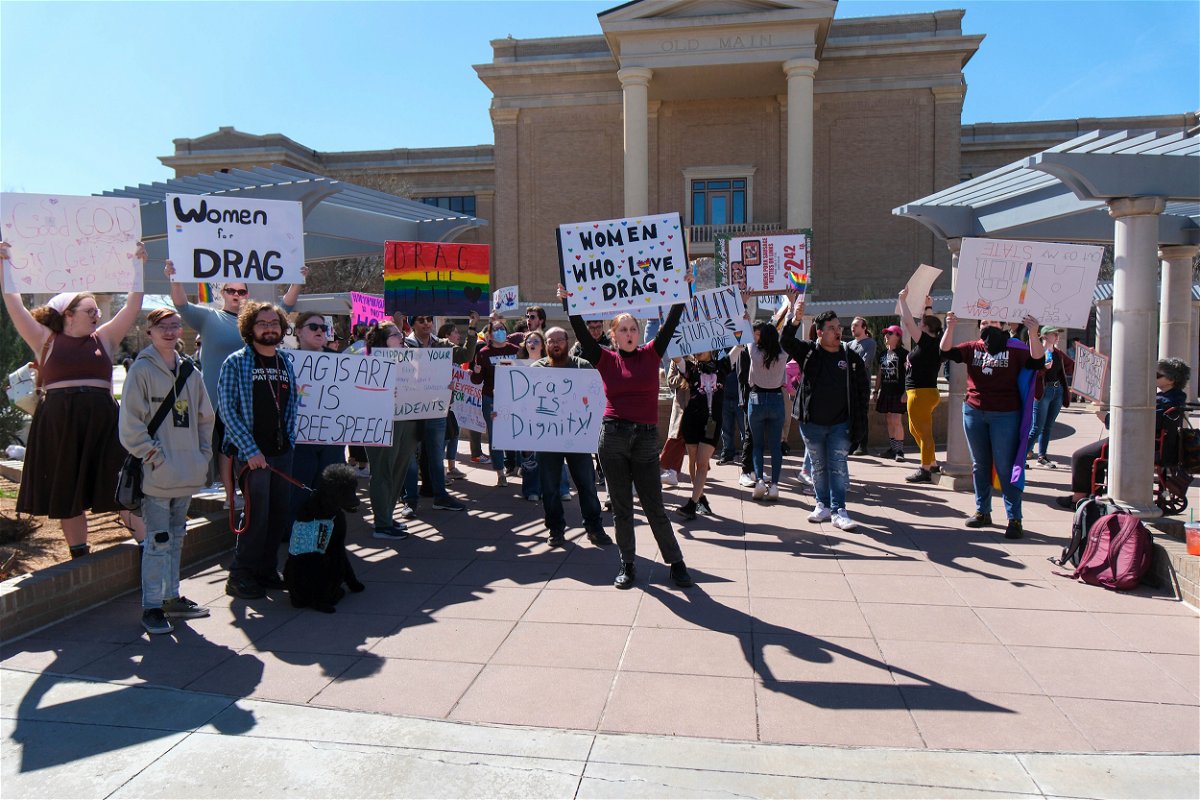 <i>Michael Cuviello/AP</i><br/>Dozens gather on March 21 at West Texas A&M University to protest the president's decision to cancel the student drag show.