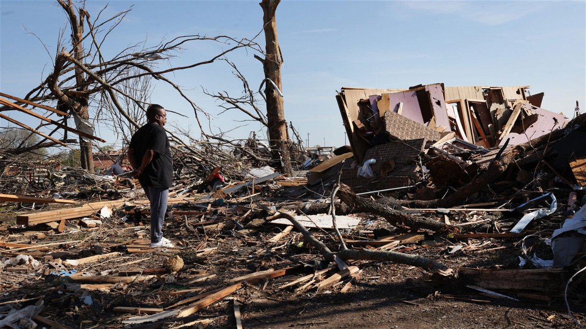<i>Scott Olson/Getty Images</i><br/>Cornelius Williams looks at what remains of the home in which he grew up after it was hit on March 24 by an EF-4 tornado