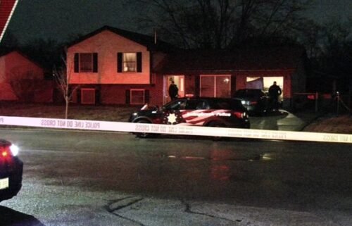 A suspect is in custody after a child and two adults were killed in a possible home invasion shooting in Bolingbrook